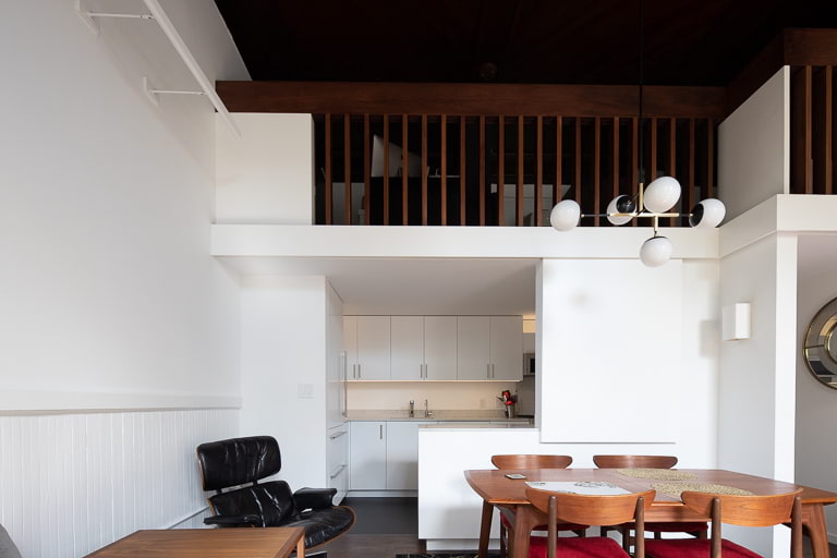 Bill Penner Cobble Hill loft living room view towards loft and kitchen