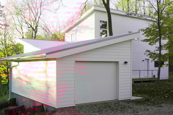 Bill Penner House Gambier, OH south facades with garage and pitched roofs