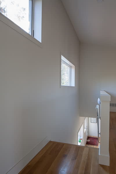 Bill Penner Architect House Gambier, OH view down from top of stairs to front door