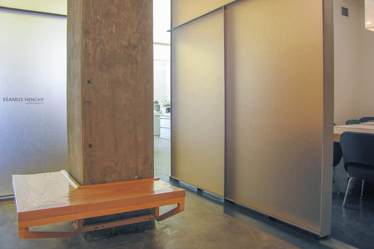 Bill Penner Tribeca office column bench and panel system